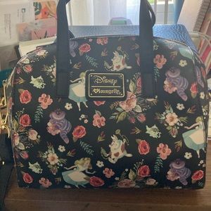 Special edition dark floral Alice in wonderland lounge fly speedy/duffle.
